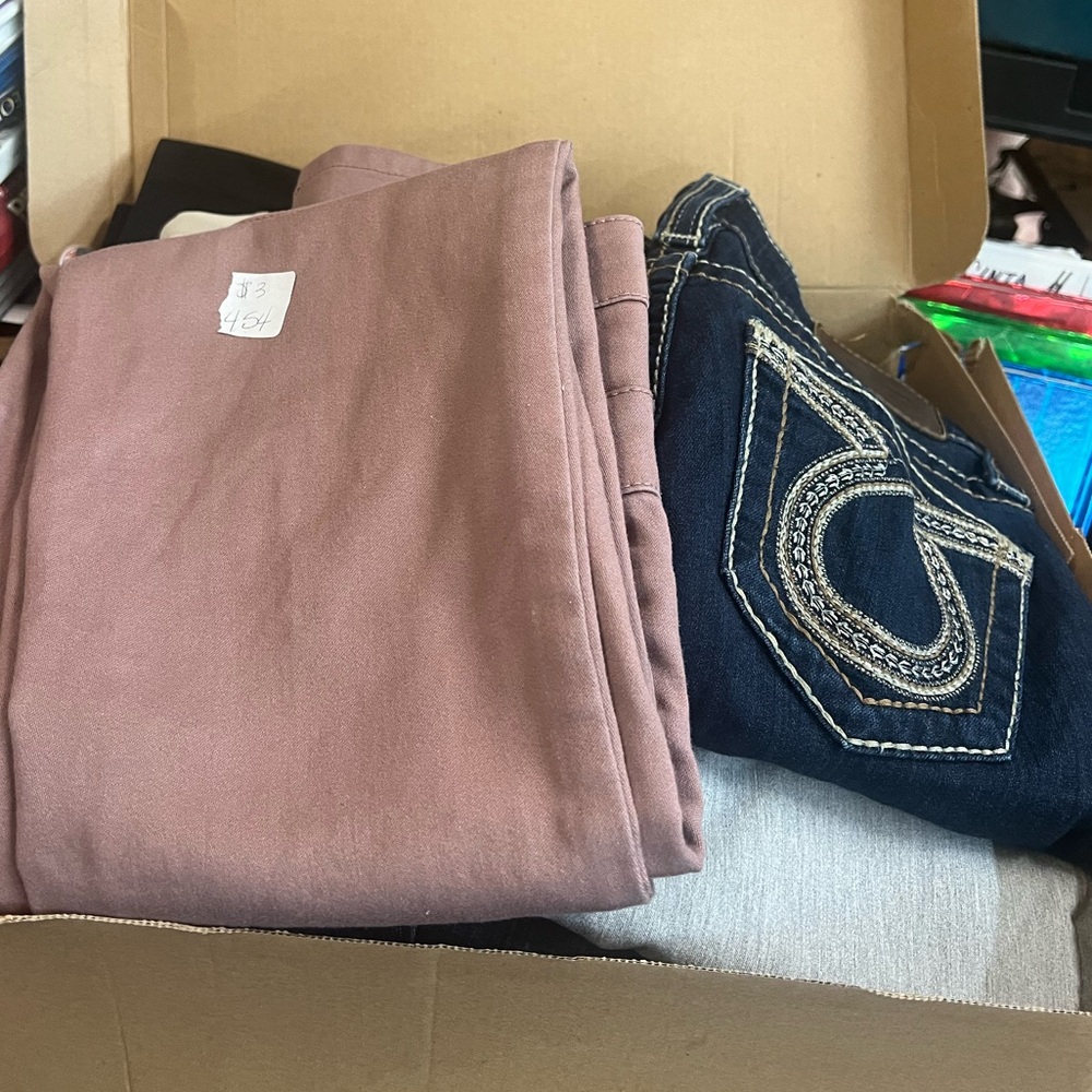 11 pair of size 0-1 junior jeans and dress pants